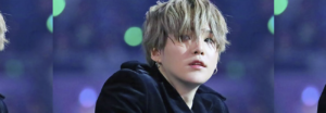 Suga de BTS rompe su chaleco con el poder de sus músculos